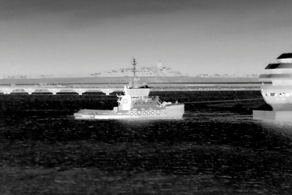 Thermal Tug Boat | FLIR Systems Tugboat in thermal bringing in a cruise ship