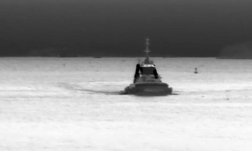 Tugboat approaching in thermal Tugboat approaching in thermal